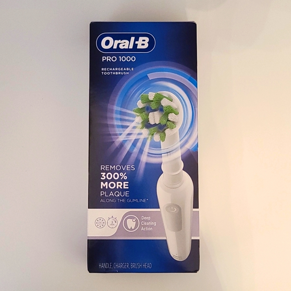 NEW Oral B Pro 1000 Rechargable Electric Toothbrush